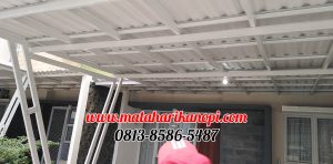 Hasil Pemasangan Kanopi Baja Ringan Atap Alderon Sunpanel Super Elegan Model Tiang V Spesial Plus Cat Putih di Perum Syamsa Naura Blok A10 Depok
