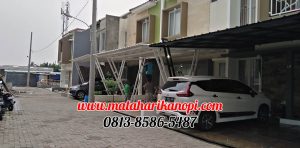 Hasil Pemasangan Kanopi Baja Ringan Atap Alderon Sunpanel Super Elegan Model Tiang V Spesial Plus Cat Putih di Perum Syamsa Naura Blok A10 Depok