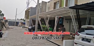 Hasil Pemasangan Kanopi Baja Ringan Atap Alderon Sunpanel Super Elegan Model Tiang V Spesial Plus Cat Putih di Perum Syamsa Naura Blok A10 Depok