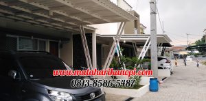 Hasil Pemasangan Kanopi Baja Ringan Atap Alderon Sunpanel Super Elegan Model Tiang V Spesial Plus Cat Putih di Perum Syamsa Naura Blok A10 Depok