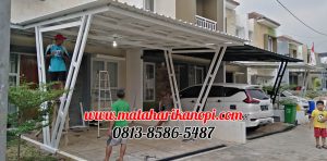 Hasil Pemasangan Kanopi Baja Ringan Atap Alderon Sunpanel Super Elegan Model Tiang V Spesial Plus Cat Putih di Perum Syamsa Naura Blok A10 Depok