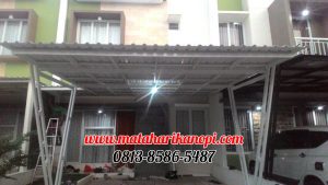 Hasil Pemasangan Kanopi Baja Ringan Atap Alderon Sunpanel Super Elegan Model Tiang V Spesial Plus Cat Putih di Perum Syamsa Naura Blok A10 Depok
