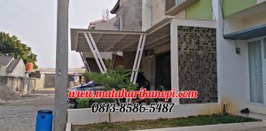Hasil Pemasangan Kanopi Baja Ringan Atap Alderon Sunpanel Super Elegan Model Tiang V Spesial Plus Cat Putih di Perum Syamsa Naura Blok A10 Depok