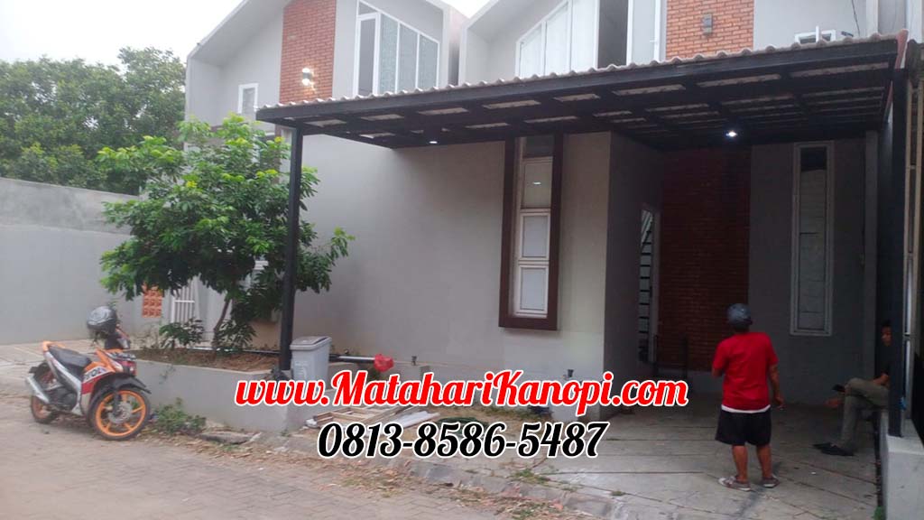 Hasil Pemasangan Kanopi Baja Ringan Atap Alderon Sunpanel Super Elegan Plus Cata Rangka Hitam di Perum Madrid Residece Cilodong Depok
