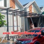Hasil Pemasangan Kanopi Baja Ringan Atap Alderon Sunpanel Super Elegan Plus Cata Rangka Hitam di Perum Madrid Residece Cilodong Depok